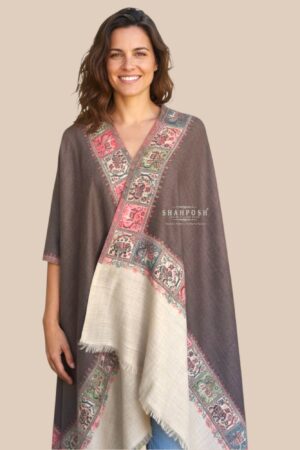 Brown shawl with intricate animal and floral designs.
