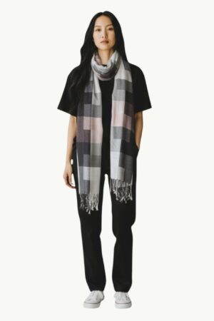 A stylish checkered Viscose Bamboo Fibre Stole in shades of black, white, and gray with subtle hints of pink.
