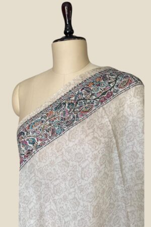 Soft beige or off-white color Stole with a subtle pattern