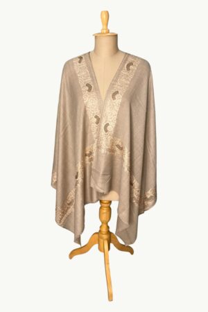 Elegant beige stole with delicate embroidered borders.