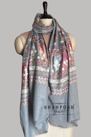 Bluish grey stole with intricate floral embroidery.