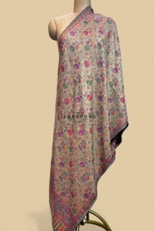 Beige wool Blend stole with vibrant floral patterns.