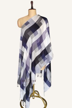 A stylish checkered Viscose Bamboo Fibre Stole in shades of blue, black, and white.