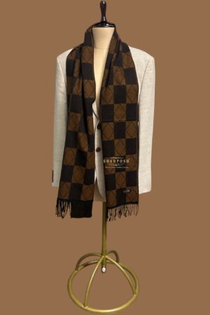 Brown and black checkered muffler are featuring a geometric diamond pattern within the checks.