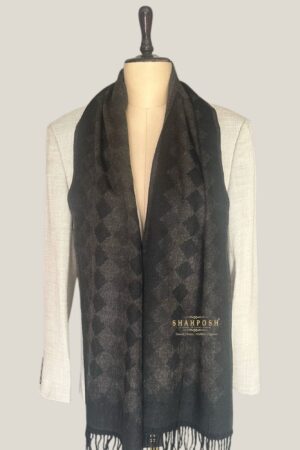 The Shahposh blackish muffler has a subtle diamond pattern,