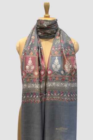 Bluish grey stole with intricate floral embroidery.