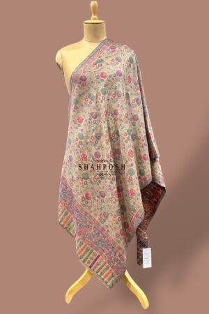 Beige wool Blend stole with vibrant floral patterns.