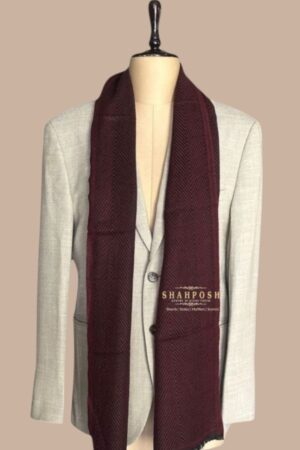 A luxuriously textured Shahposh Muffler in a hue features.