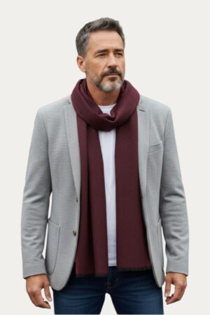 A luxuriously textured Shahposh Muffler in a hue features.