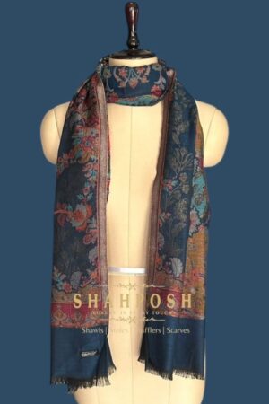 A Shahposh Luxurious Jamawar Tapestry Where Intricate Blooms in Jewel Tones Unfurl on a Midnight Canvas of Silk and Splendor, Revealing Timeless Elegance and Artisan Craftsmanship.